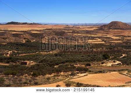 an aerial view of a rural landscape in Caspe, in the Autonomous Community of Aragon, Spain
