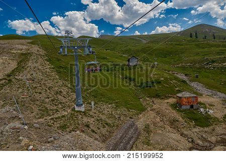 GODERDZI, GEORGIA - 08 AUGUST 2017: Newly-built modern Cable Car and Rural mountain landscapes of Georgian Adjara region near Goderdzi ski resort and village of Khulo