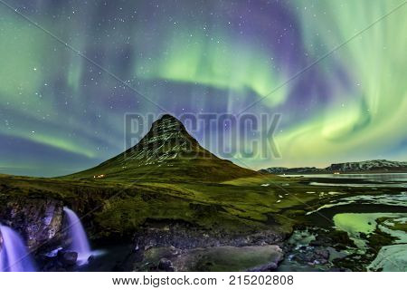 Northern Light Aurora Borealis At Kirkjufell Iceland With Fully Start In The Sky