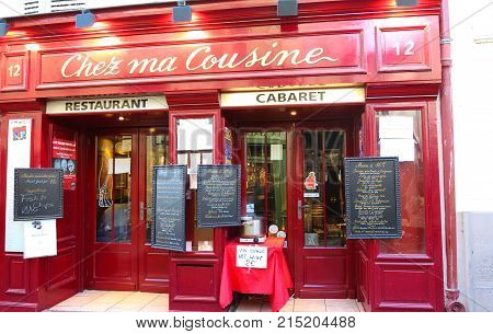 PARIS , France- November 22, 2017: View of typical paris cafe in Paris. Montmartre area is among most popular destinations in Paris, Chez ma cuisine is a typical cafe.