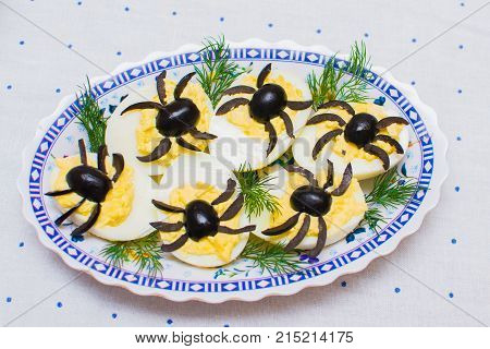Stuffed Eggs Decorated With Olives In The Form Of Spiders