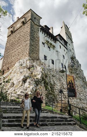 Bran, Romania - September 7, 2017: Tourists visit inside part of Bran or Dracula Castle in Transylvania, Romania.