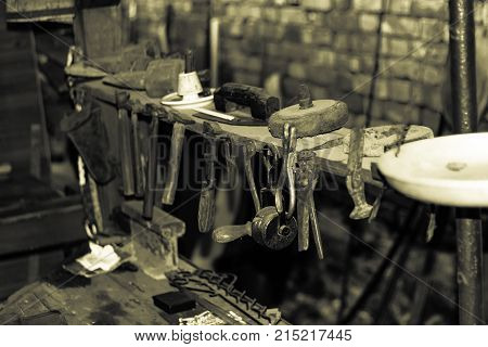 Old tools collection in a work room