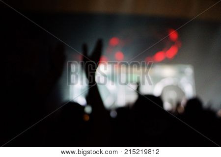 Texture Blur Scene Multicolored Lights And Smoke In Concert With Silhouettes Of Peoplebackground For