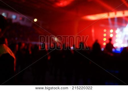Texture Blur Scene Multicolored Lights And Smoke In Concert With Silhouettes Of Peoplebackground For