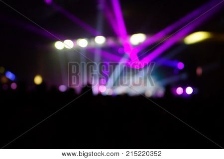 Texture Blur Scene Multicolored Lights And Smoke In Concert With Silhouettes Of Peoplebackground For
