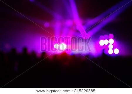 Texture Blur Scene Multicolored Lights And Smoke In Concert With Silhouettes Of Peoplebackground For
