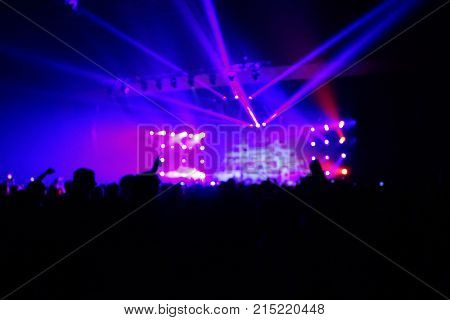 Texture Blur Scene Multicolored Lights And Smoke In Concert With Silhouettes Of Peoplebackground For