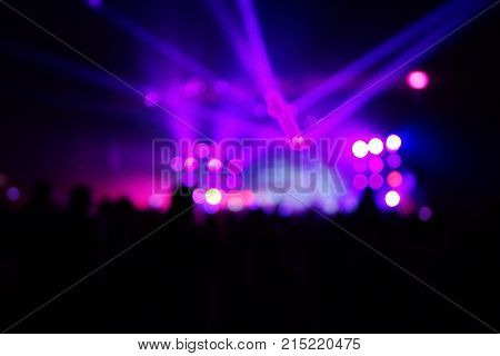 Texture Blur Scene Multicolored Lights And Smoke In Concert With Silhouettes Of Peoplebackground For