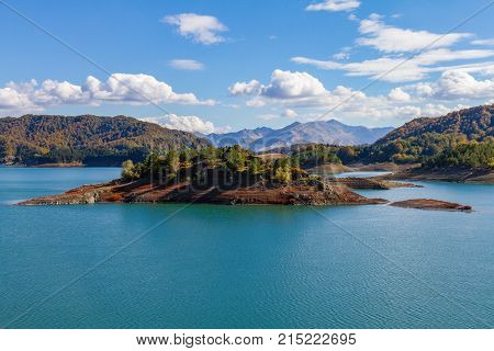 Island On The Scenic Aoos Artificial Lake In Epirus, Greece