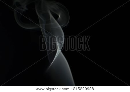 Light shine to smoke on black background