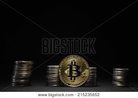 Photo Golden Bitcoins new virtual money on black background