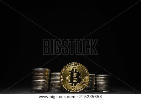Photo Golden Bitcoins new virtual money on black background