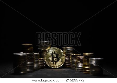 Photo Golden Bitcoins new virtual money on black background