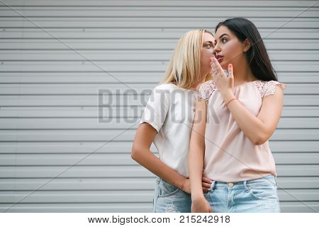 Gossip girls friends city walk concept. tittle-tattle moment. interesting secret information.