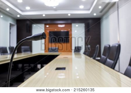Microphone and modern table boardroom Business in office. Meeting Room design with interior design setting.