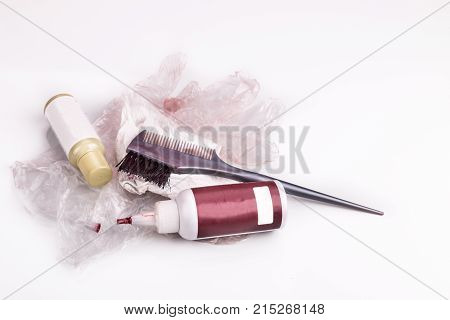 Close-up Of Chemical Hair Color Dye Set With Comb Brush