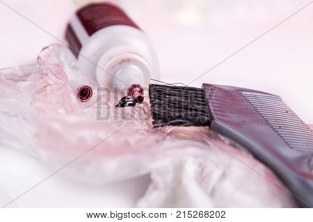 Close-up Of Chemical Hair Color Dye Set With Comb Brush