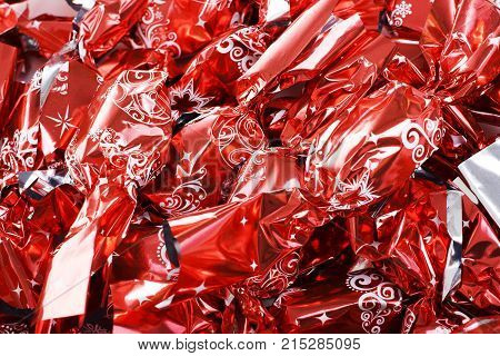 Christmas candy european christmas tree ornaments jelly sugar with chocolate in shiny red foil. Hungarian sweets.