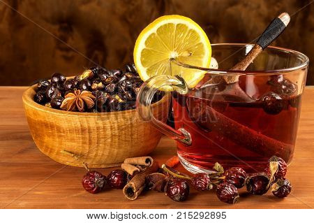 Hot rosehip tea against influenza. Home cold treatment. Dried vitamins. Traditional folk medicine