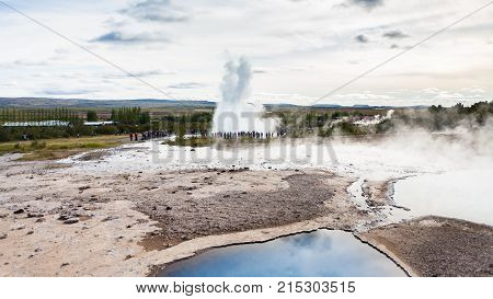 Strokkur Geyser Eruption And Geysir In Haukadalur