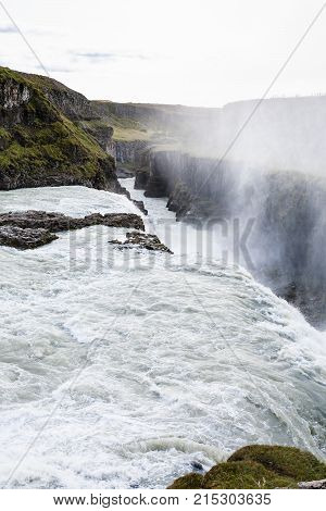 Gullfoss Waterfall Falls At The Bottom Of Canyon