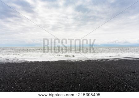 Ocean Surf On Reynisfjara Black Beach In Iceland