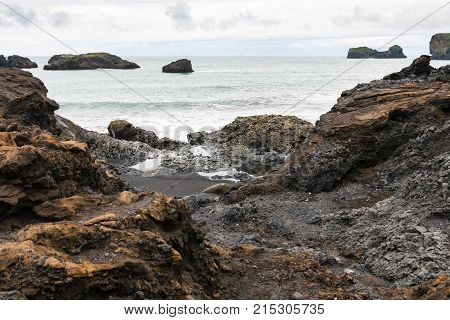 Atlantic Ocean Volcanic Coastline In Iceland