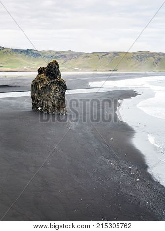 Above View Of Volcanic Stack On Kirkjufjara Beach
