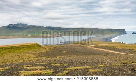 Dyrholaey Promontory And Black Beach In Iceland