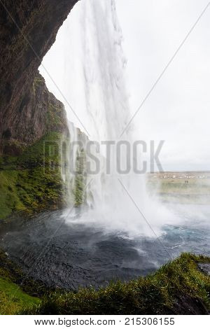 Inside View Of Seljalandsfoss Waterfall In Iceland