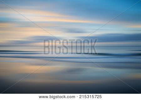 Beautiful Long Exposure Blur Sunrise Landsdcape Of Idyllic Broadhaven Bay Beach On Pembrokeshire Coa