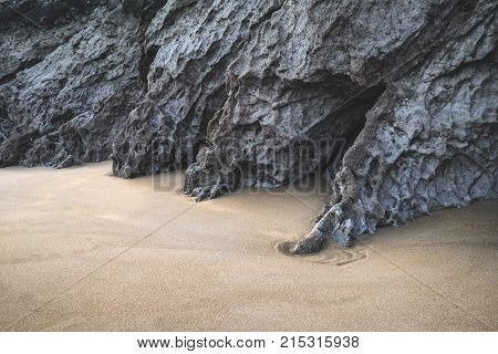 Intimate Landscape Image Of Rocks And Sand On Broadhaven Beach In Pembrokeshire Wales