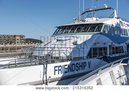 Bar Harbor Maine USA - 28 July 2017: The Friendship V catamaran of the Bar Harbor Whale Watch Company is ready to board passangers for a whale watching tour.