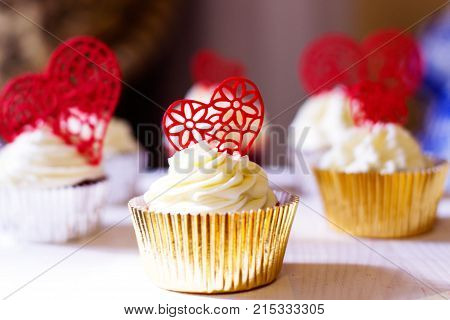 cupcakes with red hearts for Valentine's day
