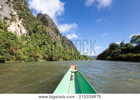 Tourist Take A Boat In Song River At Vang Vieng