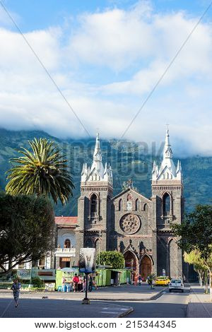 Banos Ecuador - November 24 2017: Catedral Church of Holy Water in the Central Plaza of the city of Banos de Agua Santa Ecuador