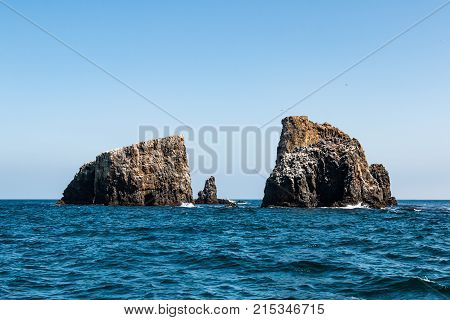 Volcanic rock formations with a sea cave at East Anacapa Island in Channel Islands National Park off the coast of Ventura, California.