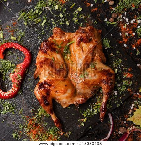 roasted tobacco chicken restaurant recipe concept. nourishing and fatty food. georgian cuisine.