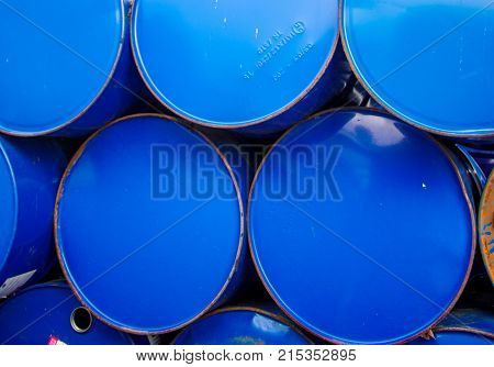 The Blue Oil Tank Is Located In The Oil Field.