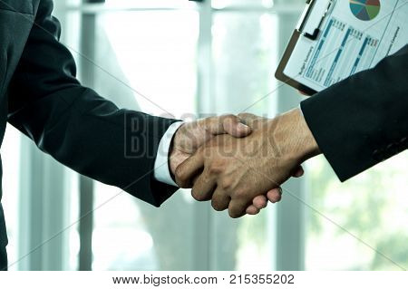 Businessmen Shake Hands And Finish Meeting In Daylight.