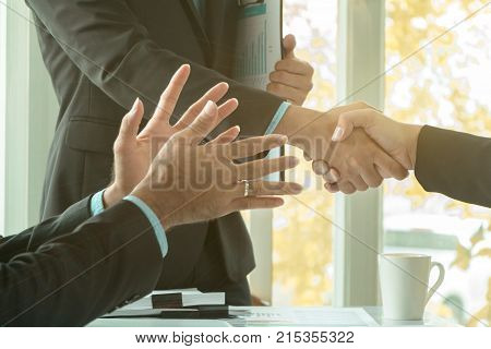 Businessmen Shake Hands And Finish Meeting In Daylight.