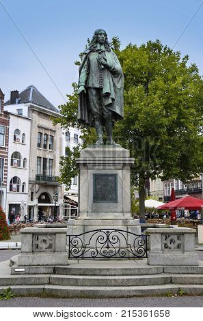 The Hague The Netherlands - August 18 2015: A statue of Johan de Witt stands in the middle of the square De Plaats in The Hague Netherlands on August 18 2015.