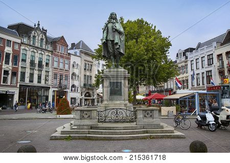 The Hague The Netherlands - August 18 2015: A statue of Johan de Witt stands in the middle of the square De Plaats in The Hague Netherlands on August 18 2015.