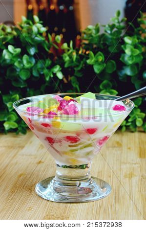 Colorful of Thai Jelly mixed with coconut milk. (Thai name is Kanom Ruam Mit)