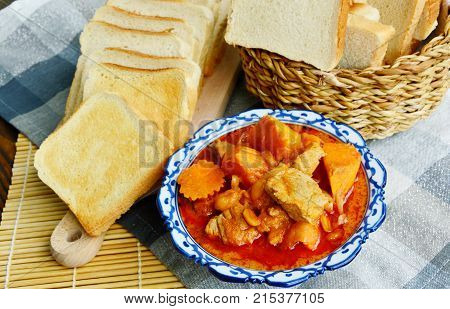 close up from Massaman Curry with toast  (Thai name is Gaeng Massaman)