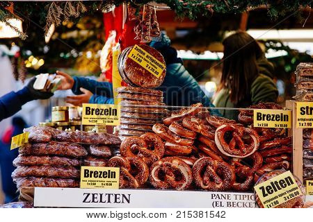 Pretzels And Other Bakery Products For Sale At Christmas Market In Bolzano,  Italy