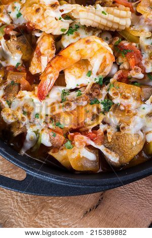 fresh shrimps casserole served with hot spices