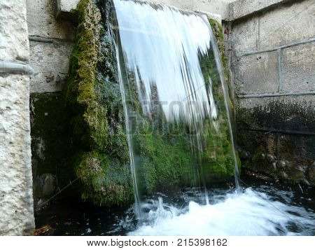 Waterfalls in the mountains of the North Caucasus surrounded by beautiful autumn nature