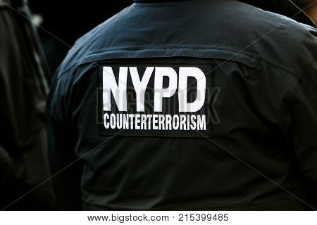 Signage on the back of the uniform of an NYPD officer from counterterrorism unit.